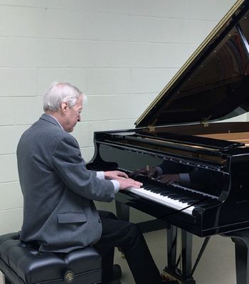 Philip Thomson, associate professor of piano and chair of Piano Studies, plays the new Steinway for the first time.